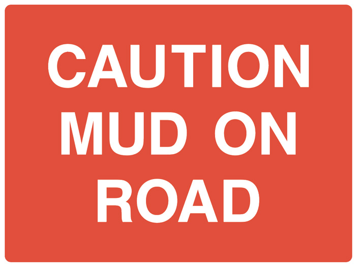 CAUTION MUD ON ROAD